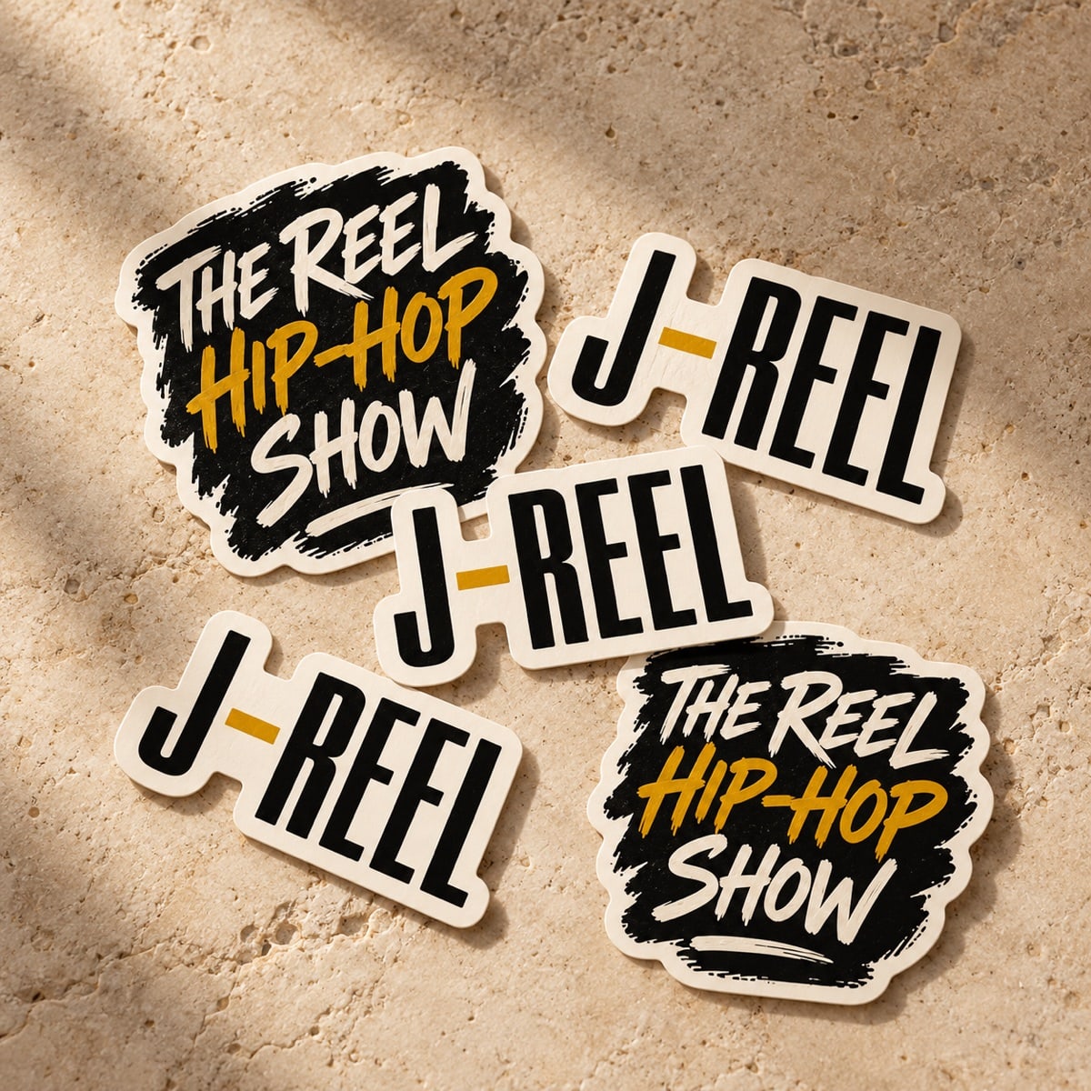 Original concept die-cut J-Reel and The Reel Hip Hop Show stickers in black, ivory and gold